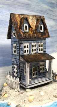 sea-worn-beach-house-putz-house-on-sandy-beach