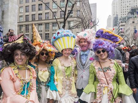100571569-new-york-ny-usa-april-1-2018-unidentified-people-in-costumes-attend-2018-new-york-easter-parade-and-